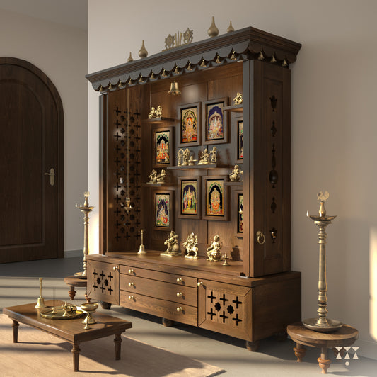 A large solid wood pooja mandir with tanjore painting of indian gods and brass idols in a living room.