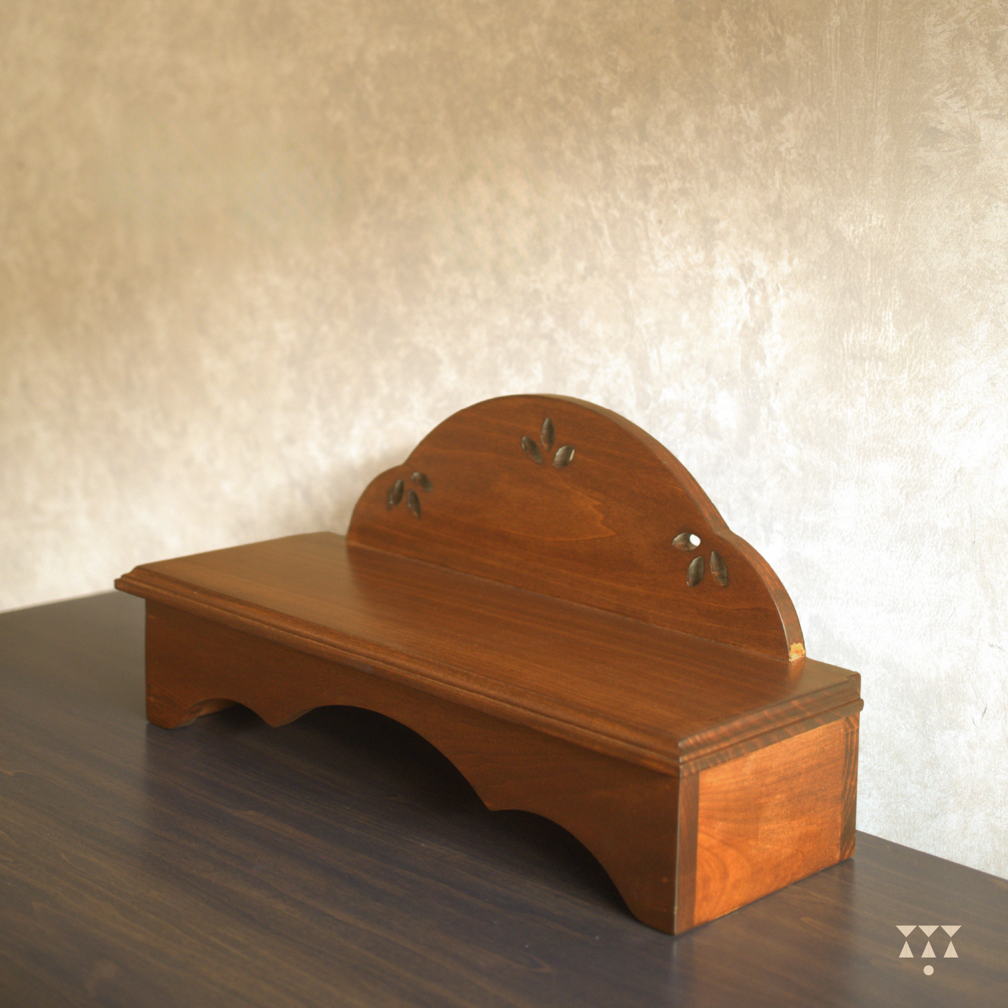 Wooden pooja platform placed on a table