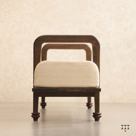Jess, a sculpted long wooden bench