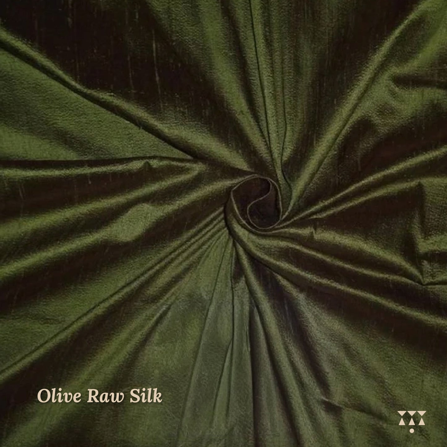 Olive green raw silk fabric with a visible brand logo in the corner.