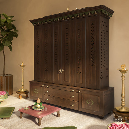 Wooden pooja temple with decorative elements in a room setting