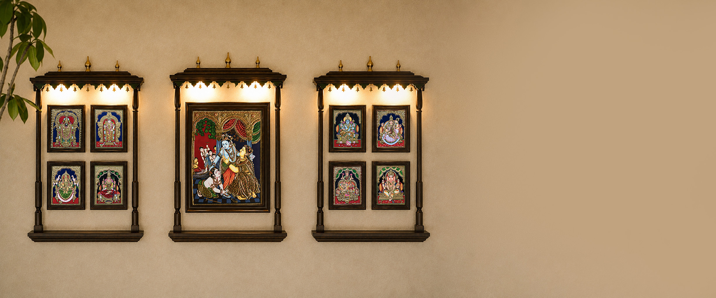Three Tanjore Art temple with warm lighting mounted on a beige wall, featuring traditional Tanjore Painting.