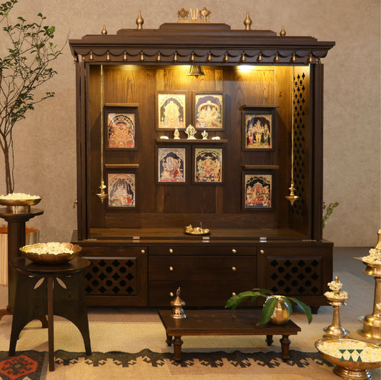 Front View of Vikat Temple - Wooden pooja temple with open doors showing decorative items and framed pictures on a beige wall.